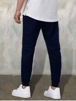 Men Letter Graphic Drawstring Waist Slant Pocket Sweatpants