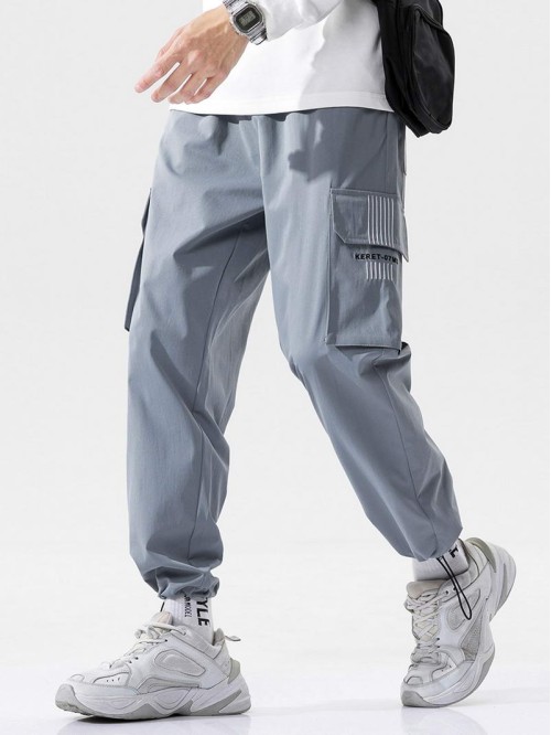 Men Side Flap Pocket Drawstring Hem Cargo Trousers