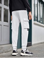 Men Mesh Panel Flap Pocket Side Joggers