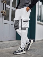 Men Mesh Panel Flap Pocket Side Joggers