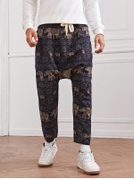 Men Drawstring Waist Animal Print Harem Pants