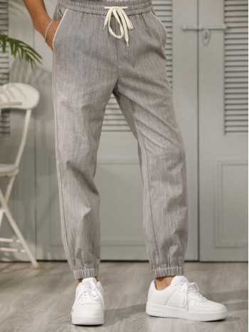 Men Drawstring Waist Slant Pocket Carrot Pants