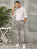 Men Drawstring Waist Slant Pocket Carrot Pants