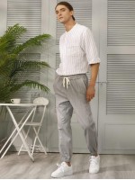 Men Drawstring Waist Slant Pocket Carrot Pants