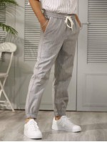 Men Drawstring Waist Slant Pocket Carrot Pants