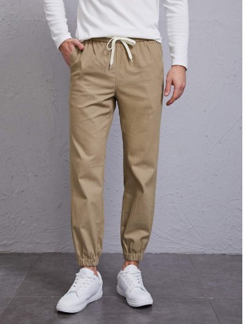 Men Drawstring Waist Slant Pocket Carrot Pants