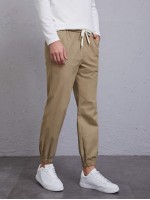 Men Drawstring Waist Slant Pocket Carrot Pants