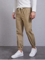 Men Drawstring Waist Slant Pocket Carrot Pants