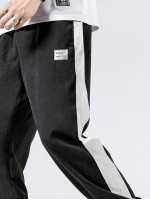 Men Contrast Panel Letter Graphic Drawstring Trousers